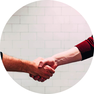 A handshake representing building connections and networking